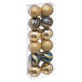 Boules de Noël bleu et or, brillantes et pailletées, dans une boîte transparente.