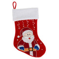 Botte de Noël rouge avec revers blanc, motif Père Noël et petites étoiles.